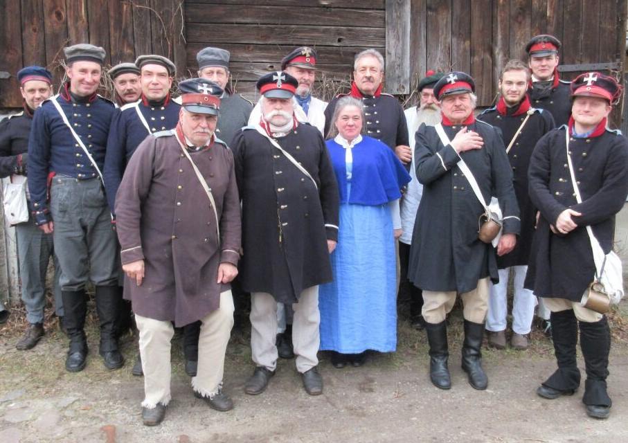 Landwehr mit Artillerie und Zivilbevölkerung